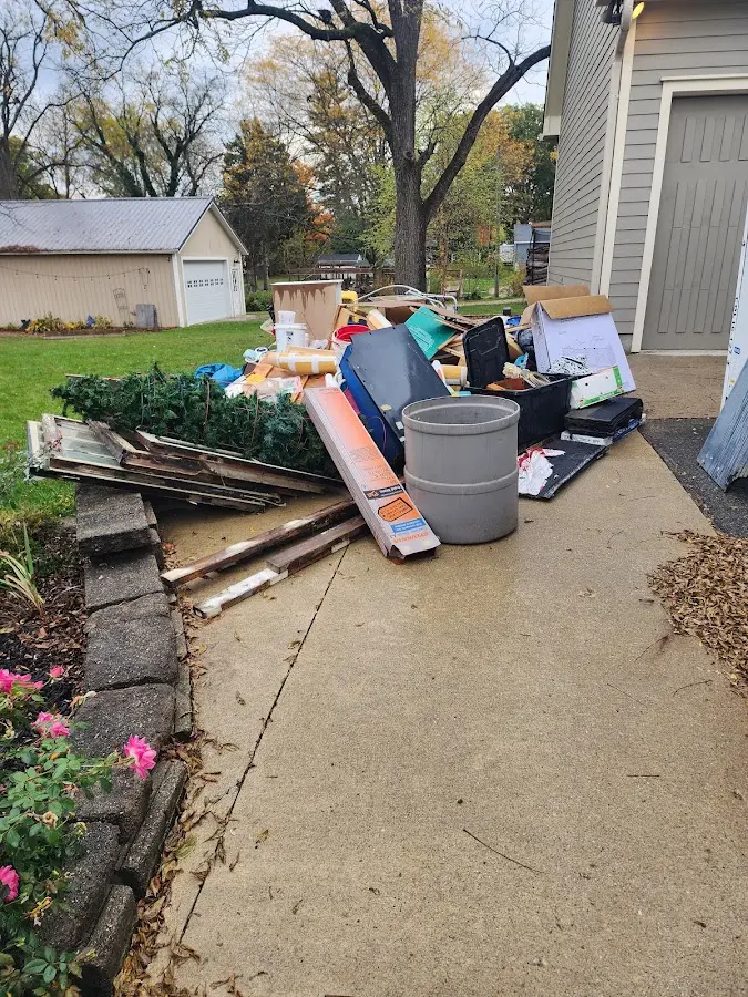 Dumpster being loaded with debris for 30 Yard Dumpster Rental in Sayreville